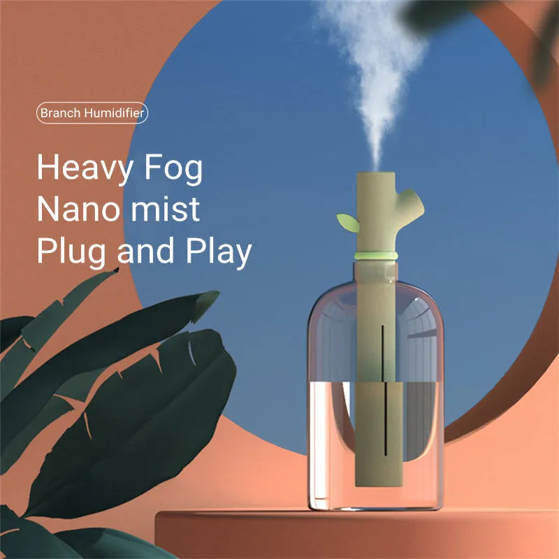 Transparent branch-shaped USB humidifier producing cool mist with 197mm height and 58mm diameter dimensions