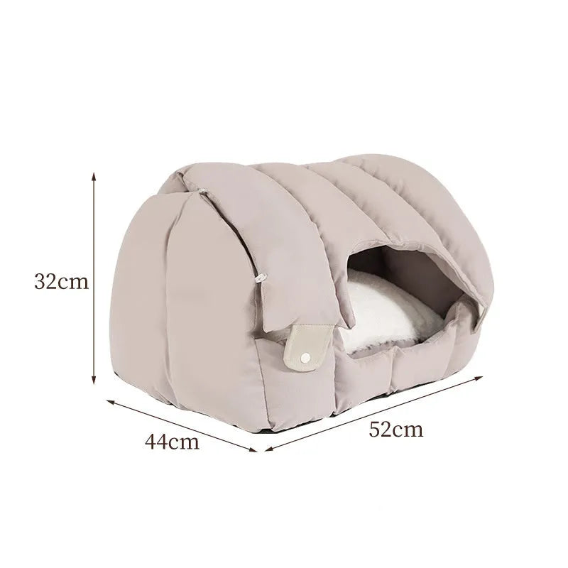Dual-purpose arched pet bed showing enclosed cat nest section and open sofa-style area