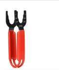 Orange cast iron pipe wrench with adjustable jaw open to 50mm, showing serrated teeth for grip