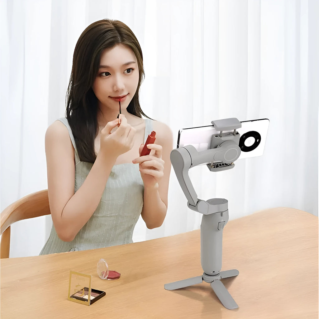Folding L7B PRO three-axis mobile phone gimbal stabiliser shown in both unfolded and compact folded sizes.