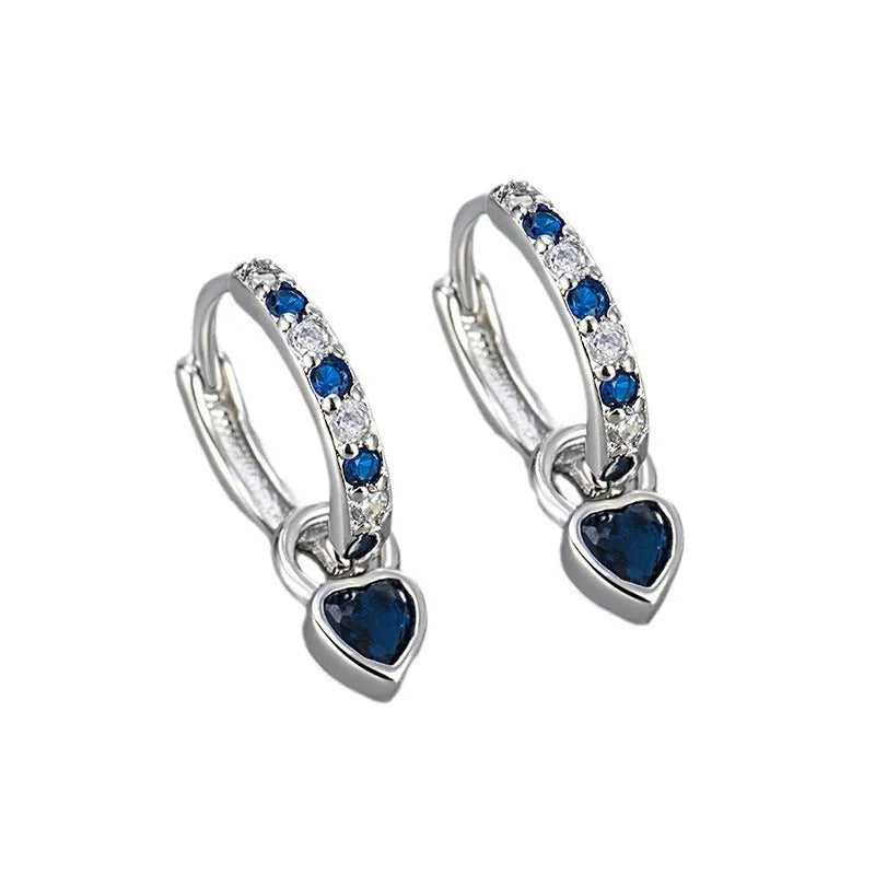Fashion zircon earrings with heart-shaped eardrops in gold or white gold colour settings with diamond-treated gemstones