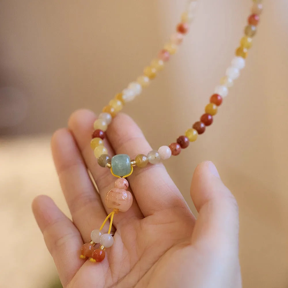 Women's three-circle pumpkin tassel jade bracelet with Jinsi Jade stones and handcrafted construction