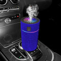 White diamond car humidifier measuring 14cm diameter on vehicle dashboard with USB cable connected