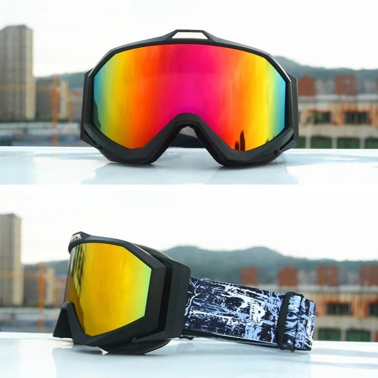 Motorcycle goggles with double-layer construction in black frame with grey lens, showing anti-fog design