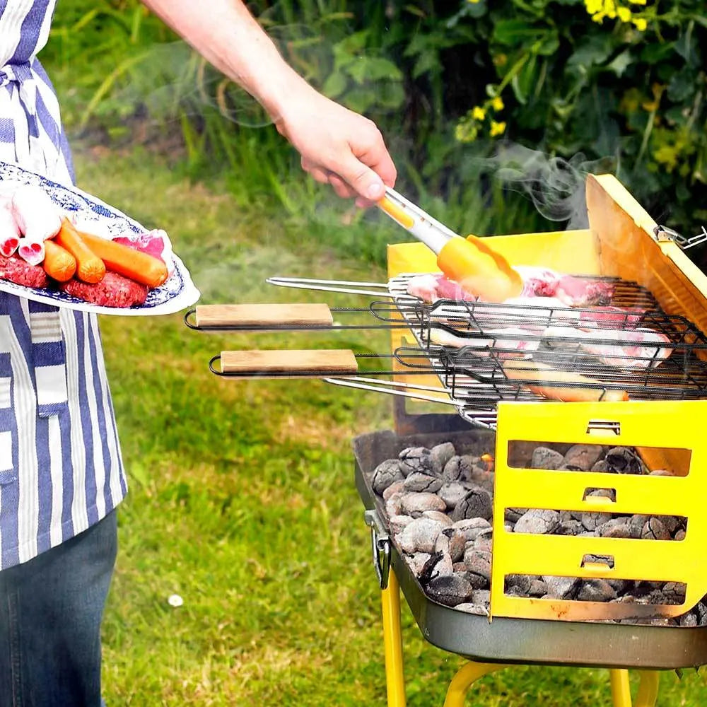 Burlywood coloured iron barbecue basket with a long wood handle for outdoor grilling.