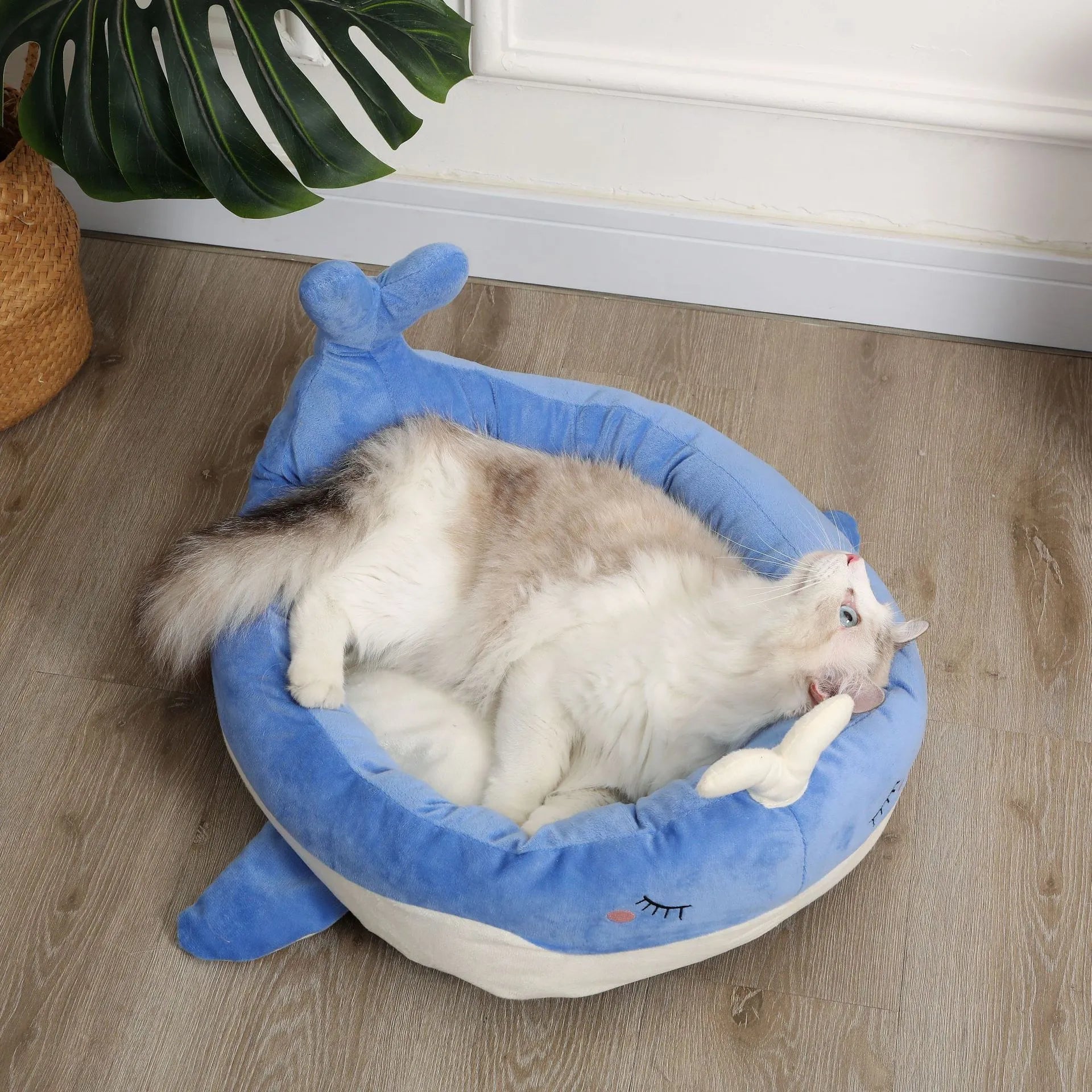 Duck-shaped pet bed sofa with fluffy polyester material in blue or white colour, showing raised sides and unique pattern design