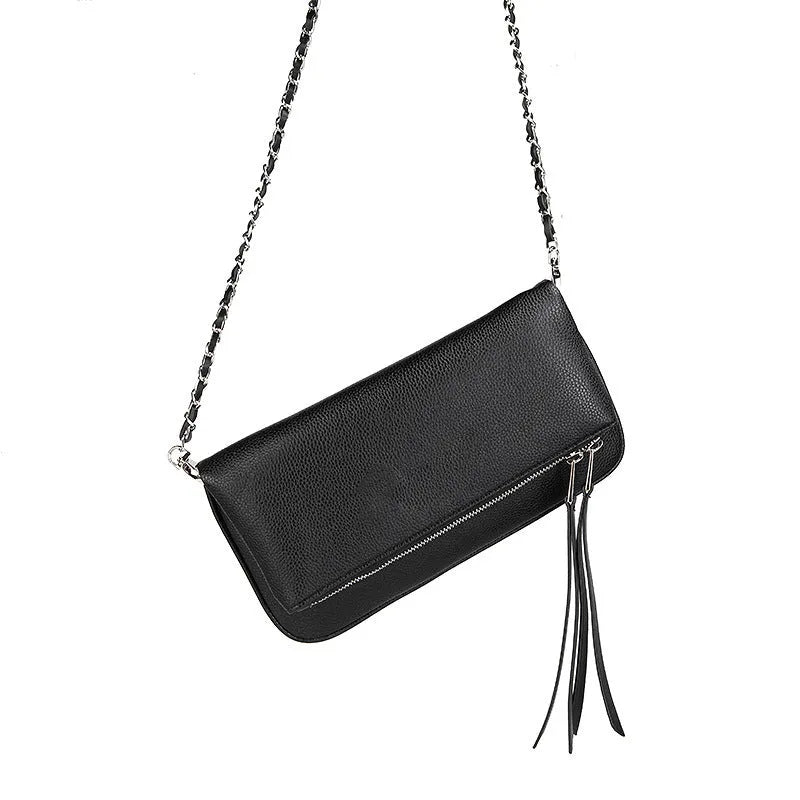 Women's black shoulder messenger bag with chain detailing and organised interior compartments