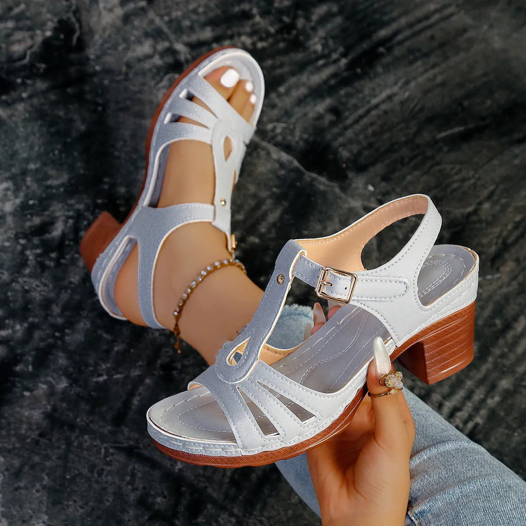 Women's black peep toe wedge platform sandals with an adjustable buckle strap on a white background.