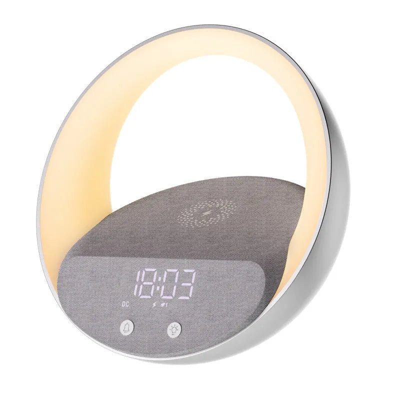 Beige multifunctional wireless charger clock with digital display, fabric speaker grille, and LED wake-up light on a wooden surface.