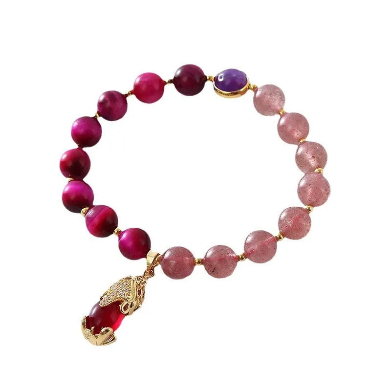 Strawberry crystal bracelet on elastic rope measuring 18cm length