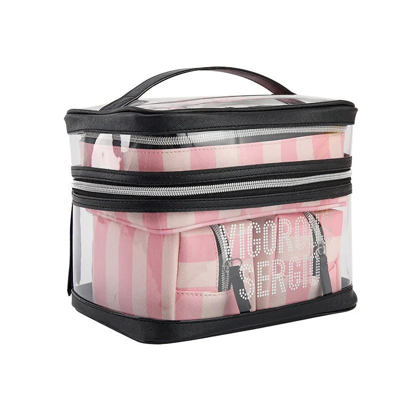 Pink bold stripes floral pattern folding makeup kit with three compartments open showing nylon lining