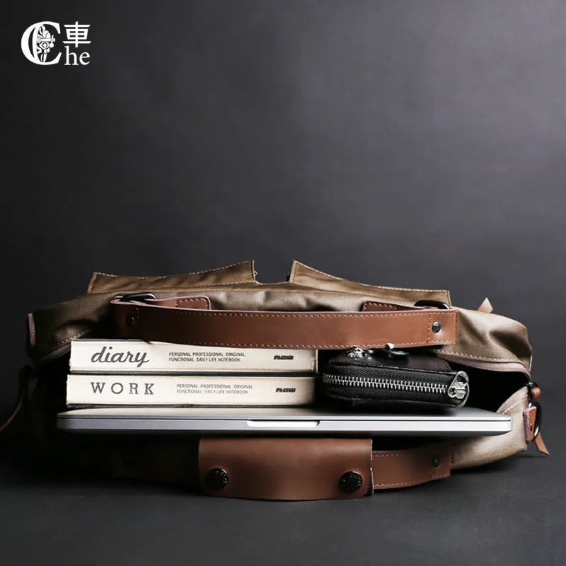 Dpark 14/15 inch laptop bag with single shoulder strap in Black colour, showing padded compartment and organisational pockets
