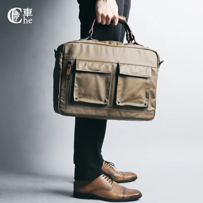 Dpark 14/15 inch laptop bag with single shoulder strap in Black colour, showing padded compartment and organisational pockets