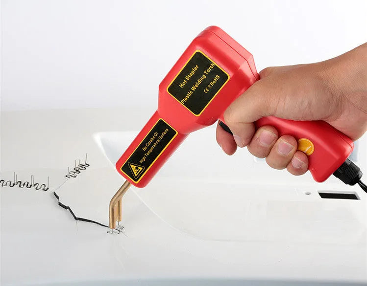 Plastic repair welding gun with LED light for car bumper repairs showing 1.7m power cord and welding nail compartment