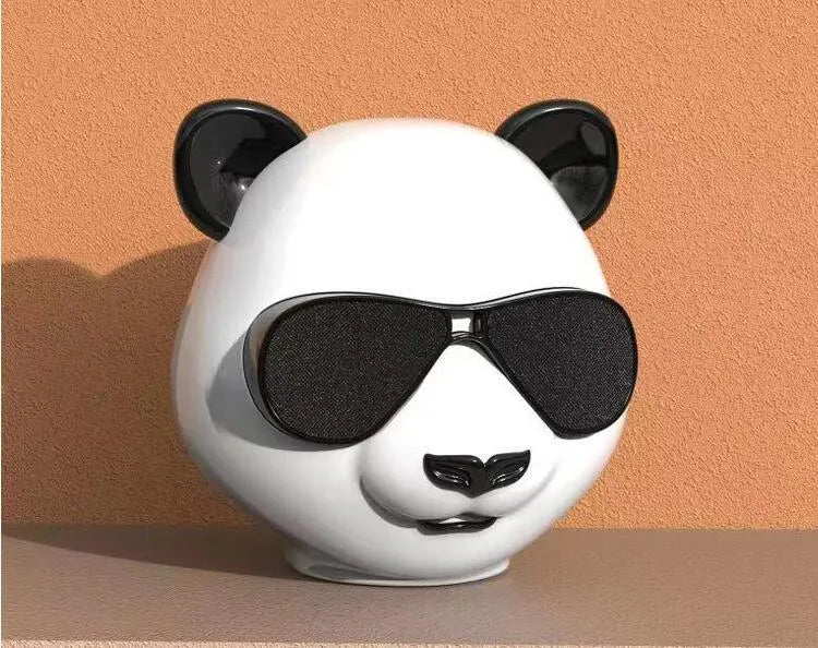Portable mini Bluetooth speaker with classic style design showing USB port for charging