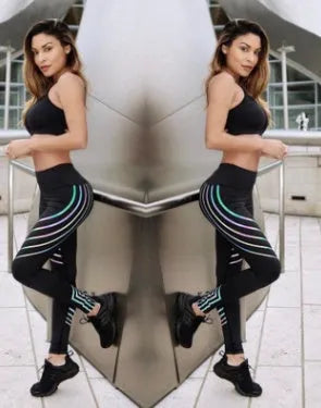 Women's glow-in-the-dark workout leggings in black with printed pattern, slim fit pencil pants length