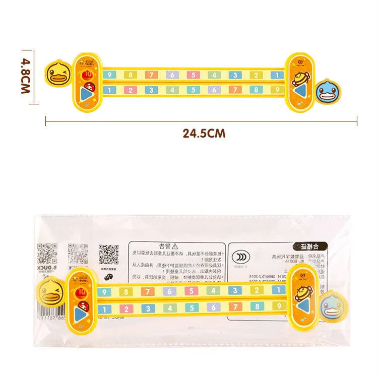 Yellow plastic cartoon digital resolution ruler for children, measuring 24.5 cm