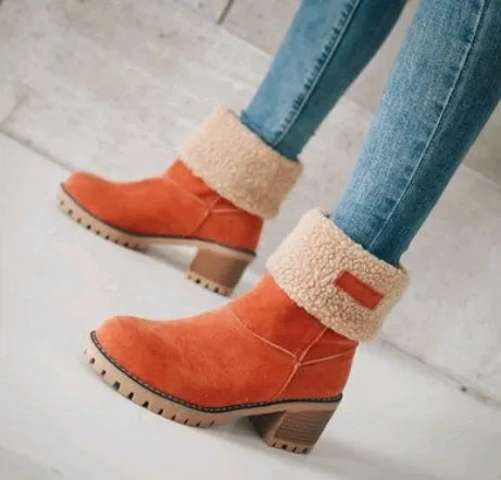 Mid-tube thick heel suede snow boots in black with round toe and low heel, showing wear-resistant soles