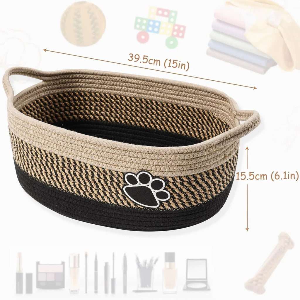 Small woven cotton rope storage basket with wooden handle in light beige, measuring 34x26x15cm, on a shelf with toys