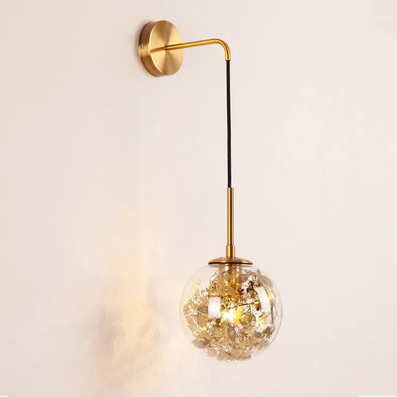 Glass bedside wall lamp with LED lighting in golden flower finish measuring 20cm diameter