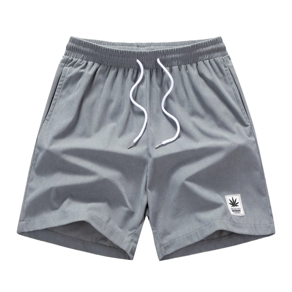 Men's elastic polyester drawstring leisure shorts in black, blue, khaki, or grey colours