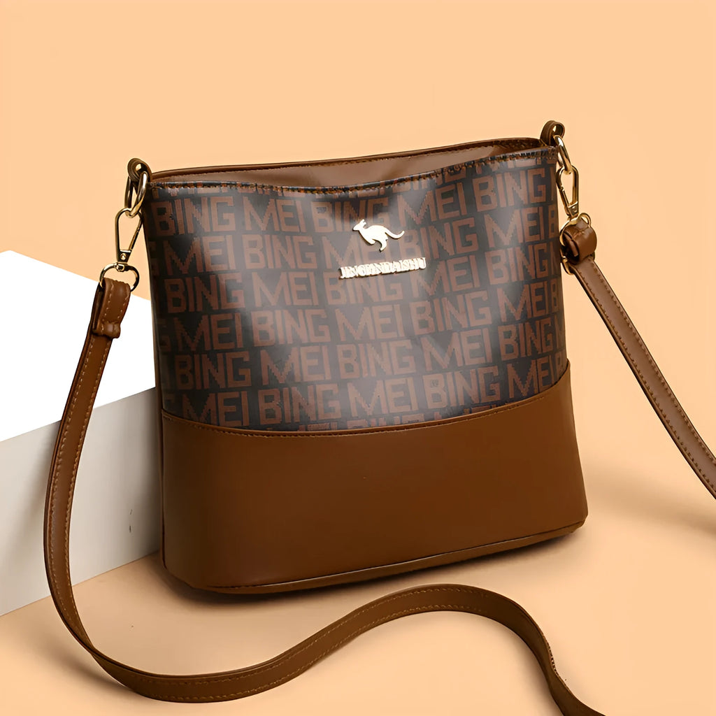 Brown retro style soft leather messenger bag with multiple compartments and sewing thread detailing