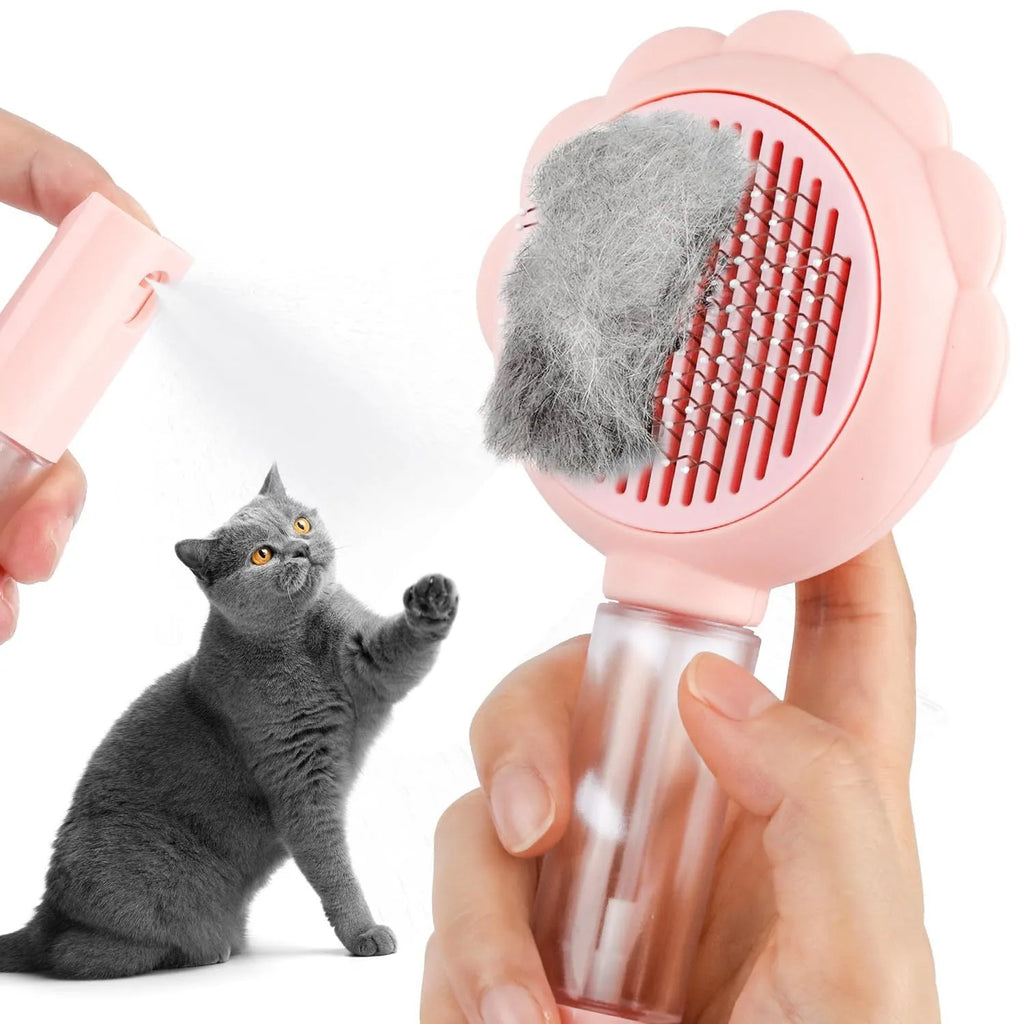 Spray cat brush with grey handle, curved metal pins, and release button for pet grooming and hair removal