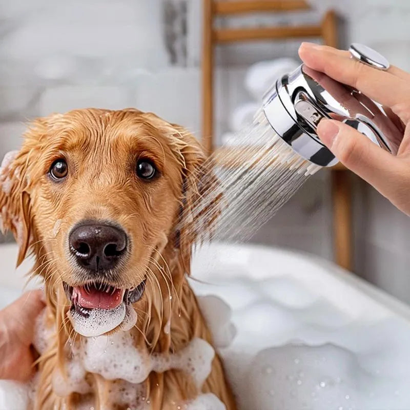 Silver dog shower attachment with silicone comb teeth and ergonomic grip for bath time