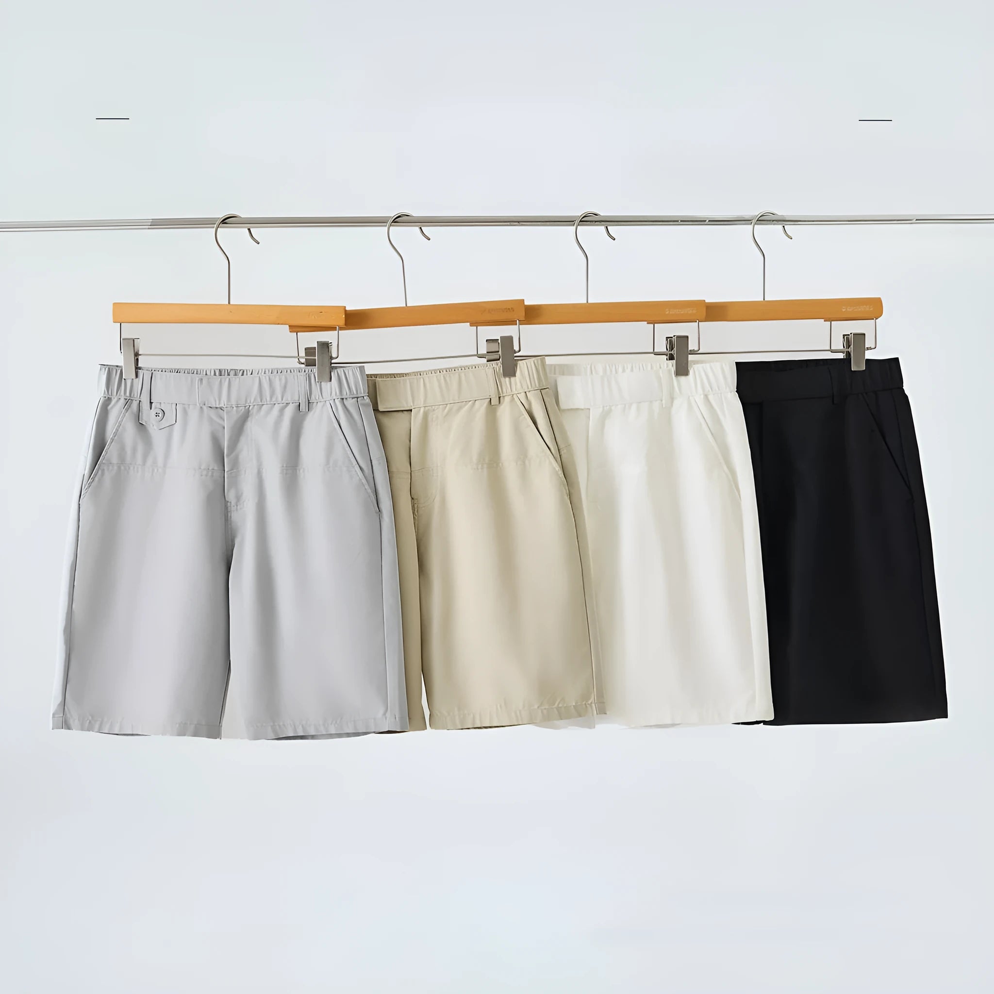 Men's light blue cotton blend casual shorts with loose fit design for summer wear