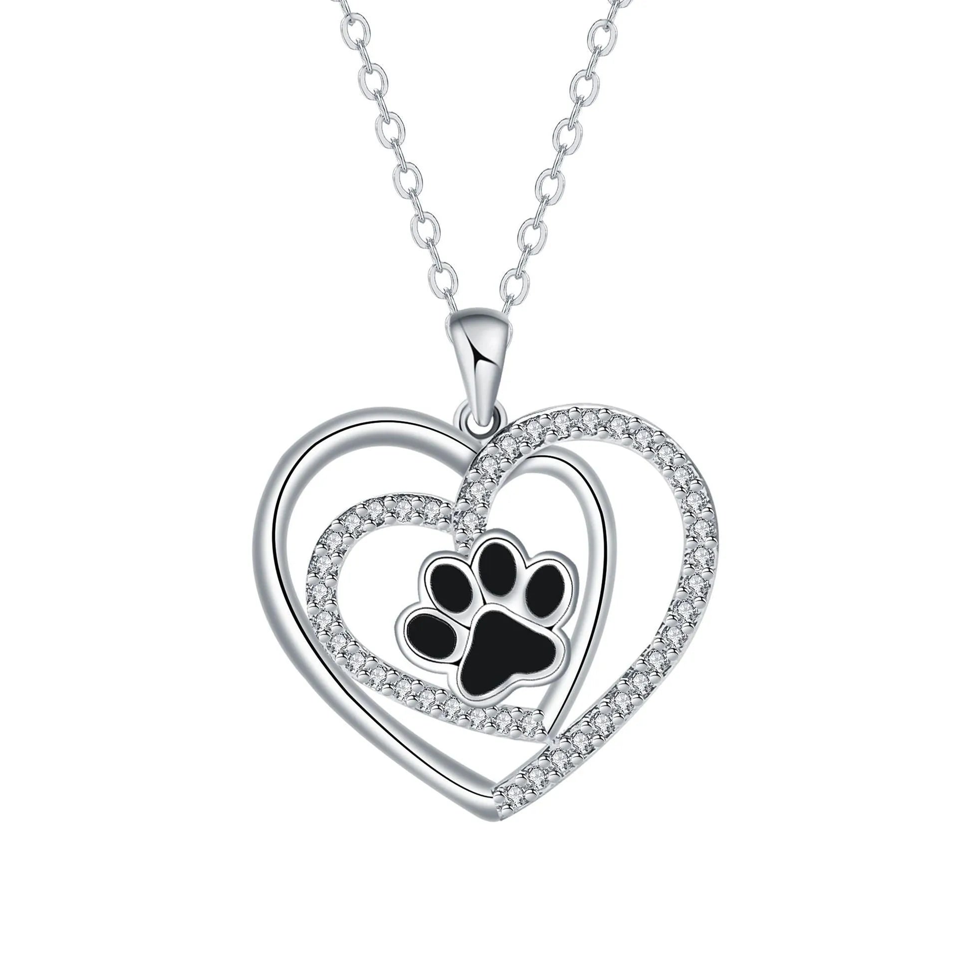 Women's copper necklace with dog paw and heart pendant on a cross chain.