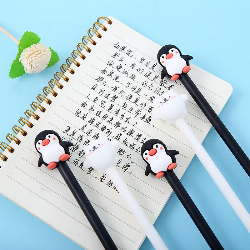 Korean cartoon penguin design gel pen with silicone grip in black or blue, showing 0.5mm tip.