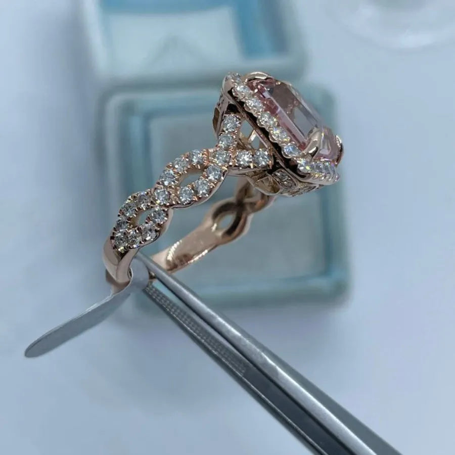 Rose gold electroplated alloy ring with geometric shape design showing angular lines and metallic finish
