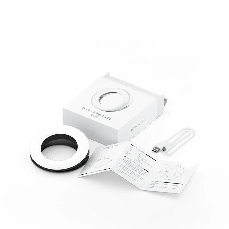 LED selfie ring light with adjustable brightness, compact 90mm design, and USB cable for mobile photography