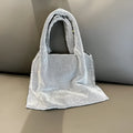 Silver cotton thread party handbag with shiny rhinestones and open outer pocket