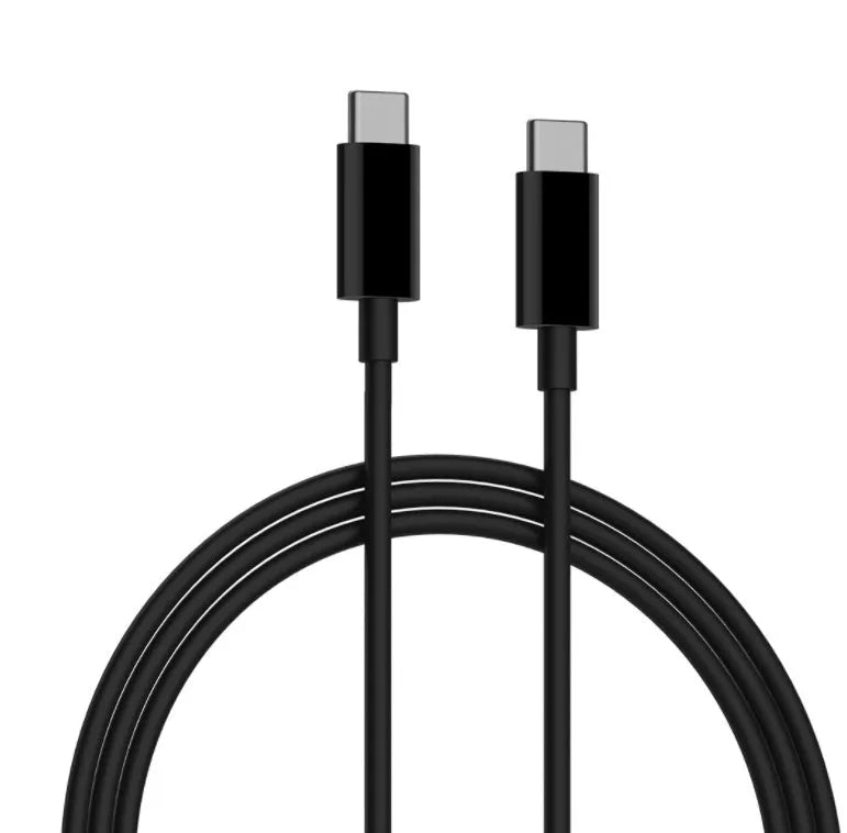 Black ZMI 65W USB-C laptop power adapter showing compact dimensions