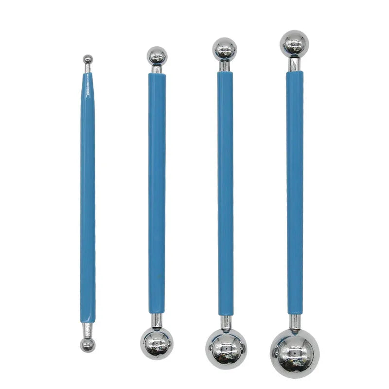 Pottery tool set with stainless steel and acrylic tools inside a blue pen bag.