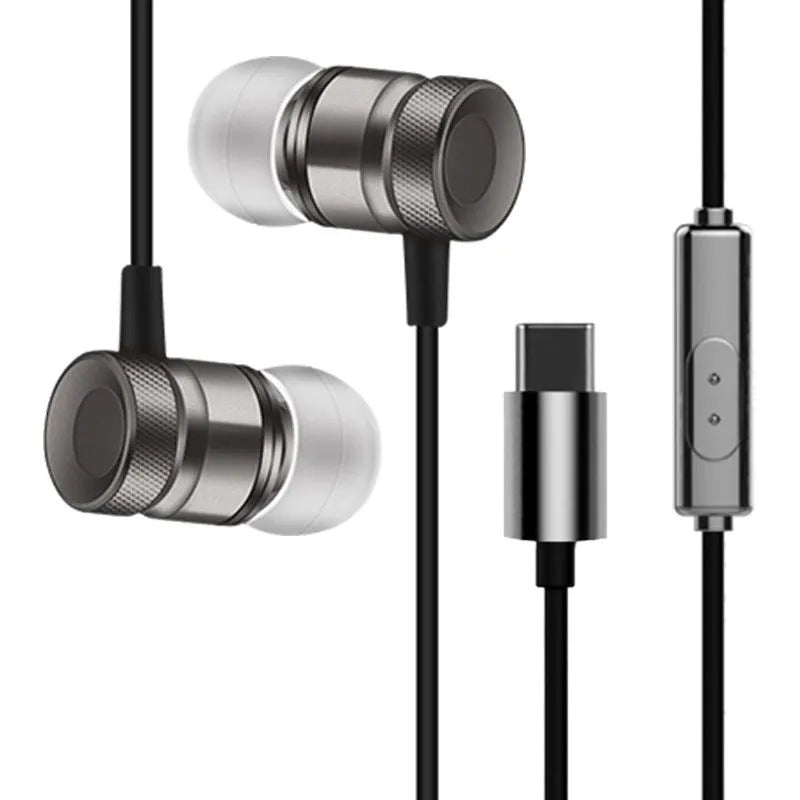 Black, gold, pink, and silver coloured in-ear headphones with a 3.5mm plug.