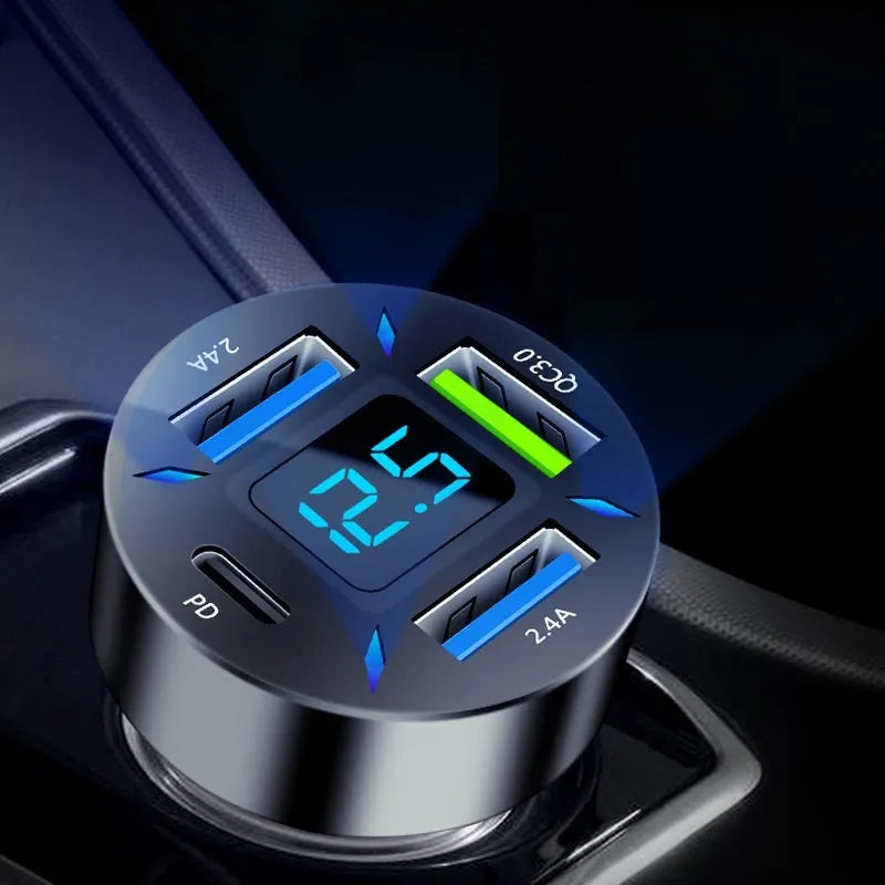 Four-port USB car charger with LED digital display showing voltage indicators, compact design for vehicle cigarette lighter sockets