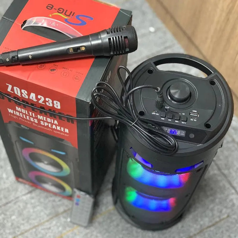 Black portable Bluetooth speaker with dual horn design and wheat-themed accents