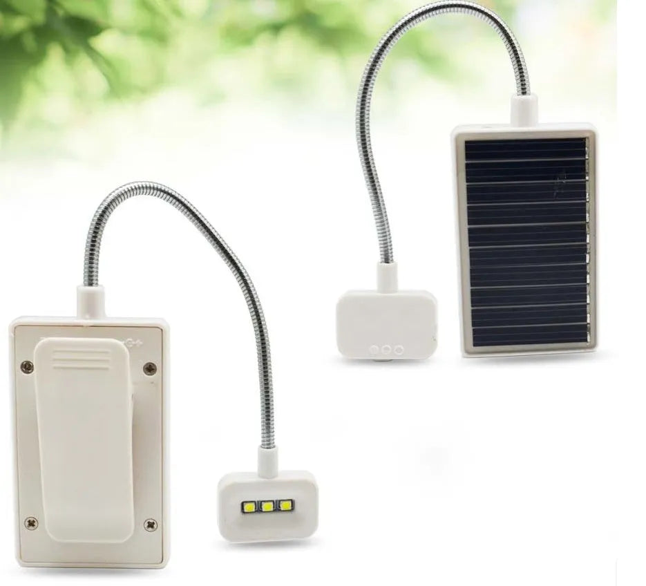 Solar garden lamp with plastic shade and LED light for outdoor use