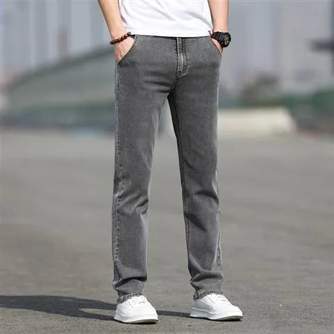 Men's straight leg jeans in smoky gray with low waist and zipper fly closure