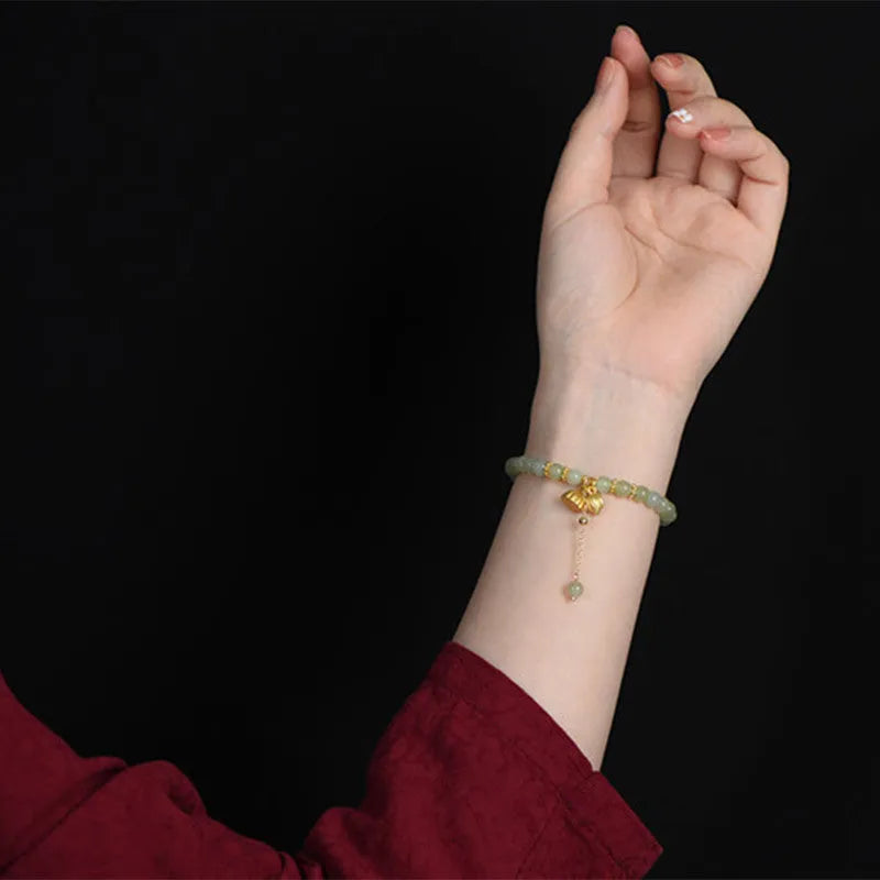 Shihuan natural Hetian jade sunny water bracelet with fu character and constellation detailing on 6mm beads