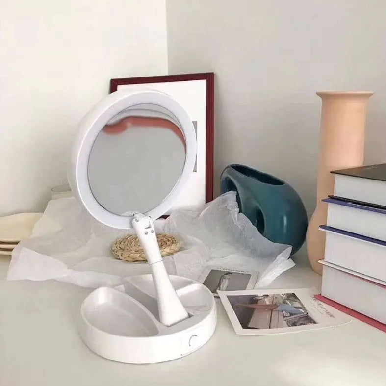 White acrylic double-sided LED vanity mirror with 360-degree rotation and USB charging cable
