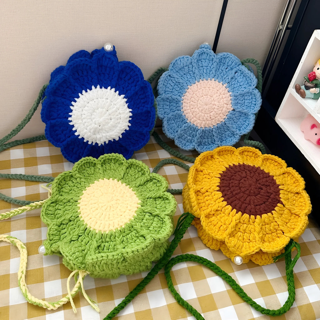 Round hand-woven bag with crocheted wool flowers and cotton lining in multiple colour options