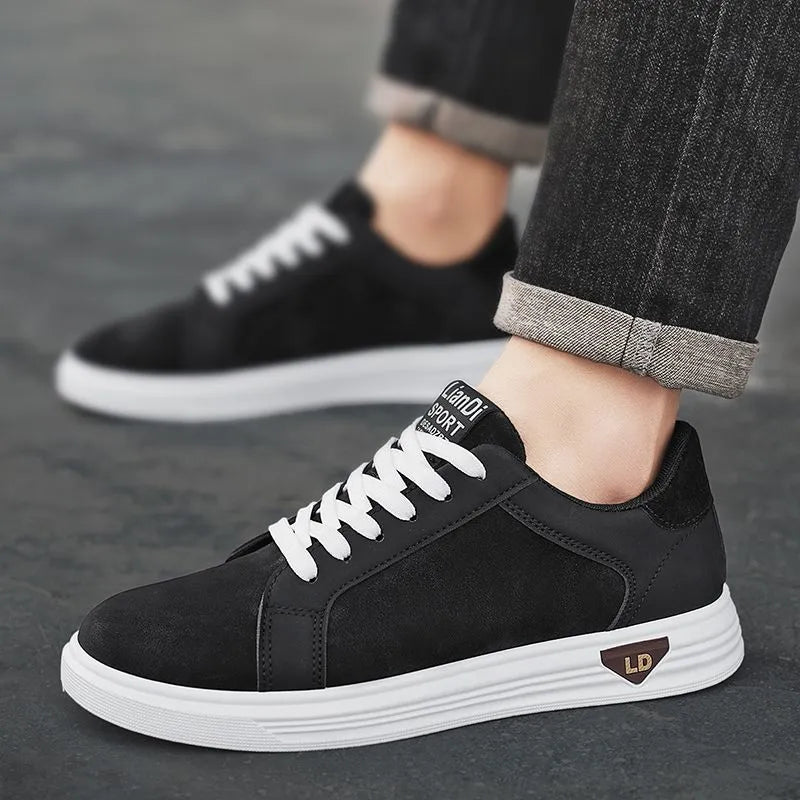 Men's black snake pattern PU leather casual sneakers with round toe and rubber sole on a white background.