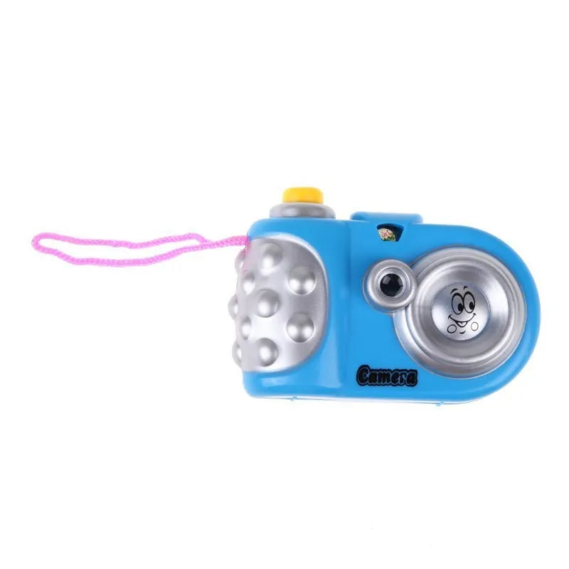 Blue or pink kids plastic projection camera toy with sliding lip, showing dinosaur and dolphin images.