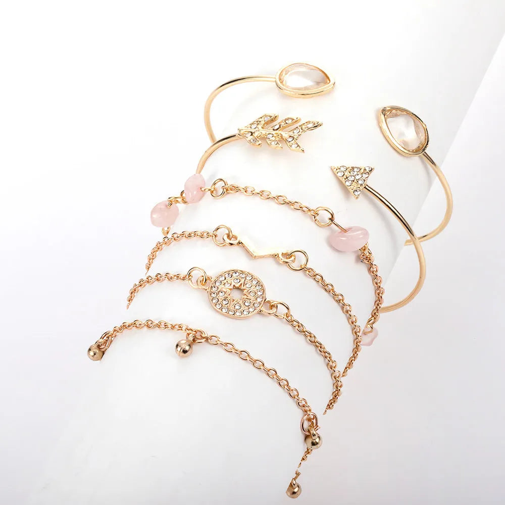 Women's six-piece gold colour zinc alloy bracelet set with arrow and water drop shaped charms