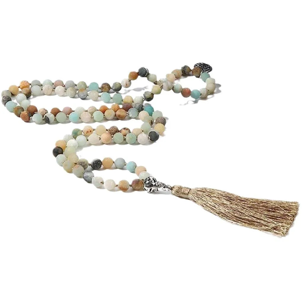 Handmade knotted beaded necklace with 108 stone pendants showing colour variations