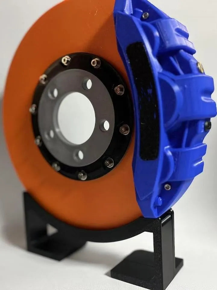 Blue brake disc LED rechargeable night light with touch dimmer on a desktop