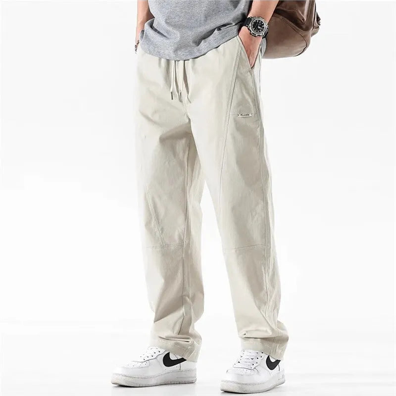 Cotton blend wide-leg trousers with elasticated waistband in milky white colour